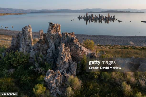Tufa towers, calcium carbonate formations that grow in carbonate-rich saltwater lakes, are seen at Mono Lake on July 17, 2021 near Lee Vining,...