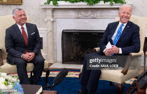 President Joe Biden and Jordan's King Abdullah II hold a meeting in the Oval Office of the White House in Washington, DC, on July 19, 2021.