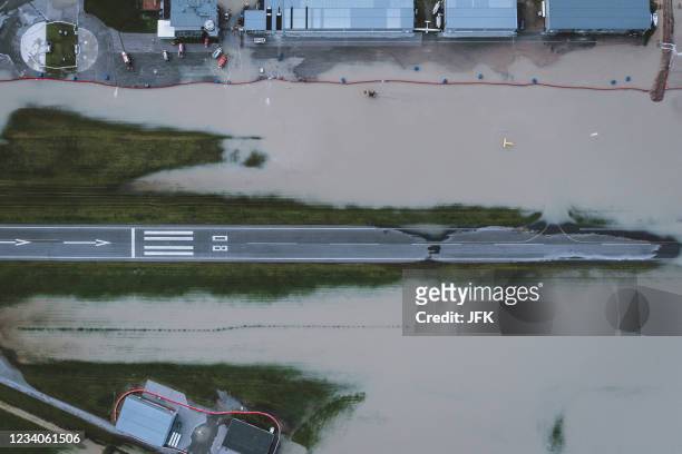 An aerial view shows an overflooded airport in Zell am See, on July 19, 2021. / Austria OUT