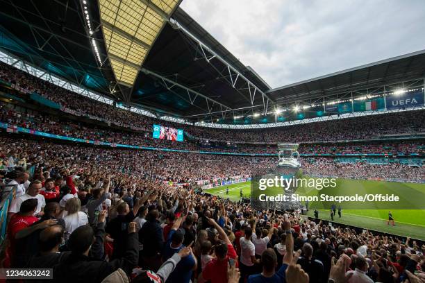 Large inflatable version of the trophy is seen on the pitch before the UEFA Euro 2020 Championship Final between Italy and England at Wembley Stadium...