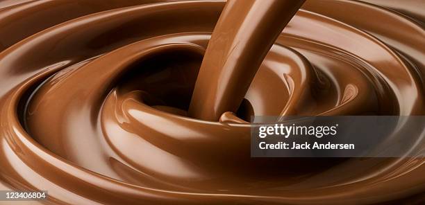 chocolate swirl - chocolate swirls stock-fotos und bilder