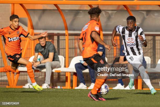 Mohamed Amissi of Heracles Almelo battle for the ball during the Pre-Season Friendly match between FC Volendam and Heracles Almelo at Kras Stadion on...