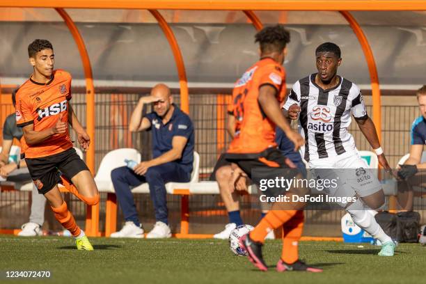 Mohamed Amissi of Heracles Almelo battle for the ball during the Pre-Season Friendly match between FC Volendam and Heracles Almelo at Kras Stadion on...