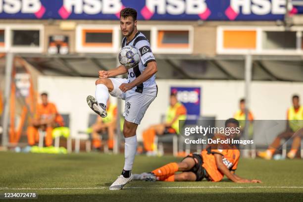 Sinan Bakis of Heracles Almelo controls the ball during the Pre-Season Friendly match between FC Volendam and Heracles Almelo at Kras Stadion on July...