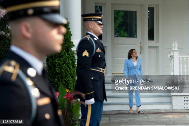 Vice President Kamala Harris arrives to greet Jordan's King Abdullah II and Jordan's Crown Prince Hussein for a working lunch at the Vice President's...