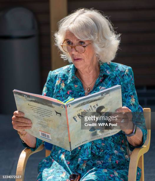 Camilla, Duchess of Cornwall reads to schoolchildren during a visit to Five Islands Academy in St Mary's on July 20, 2021 on the Isles of Scilly,...