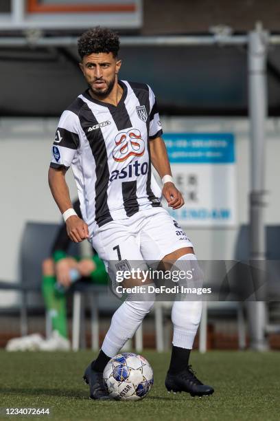 Bilal Basacikoglu of Heracles Almelo controls the ball during the Pre-Season Friendly match between FC Volendam and Heracles Almelo at Kras Stadion...