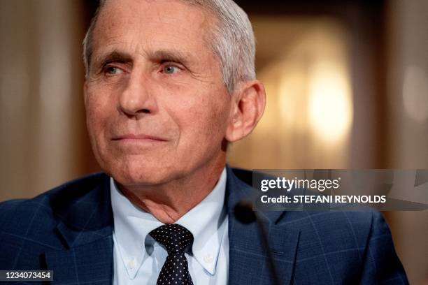 Dr. Anthony Fauci, director of the National Institute of Allergy and Infectious Diseases, arrives to testify during the Senate Health, Education,...