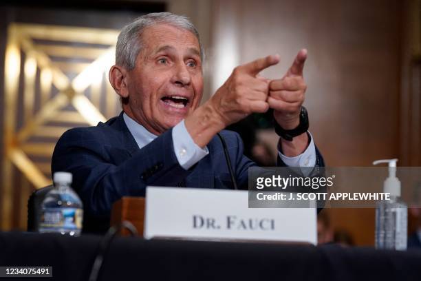 Dr. Anthony Fauci responds to accusations by Sen. Rand Paul, R-KY, as he testifies during the Senate Health, Education, Labor, and Pensions Committee...