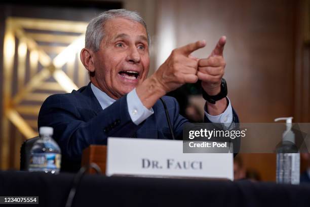 Top infectious disease expert Dr. Anthony Fauci responds to accusations by Sen. Rand Paul, R-Ky., as he testifies before the Senate Health,...