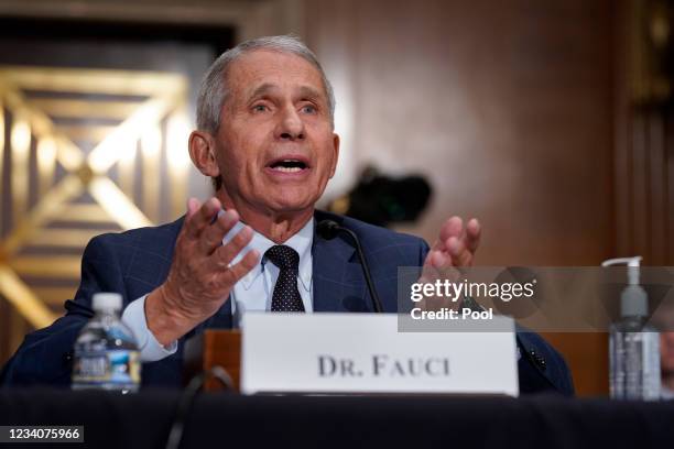 Top infectious disease expert Dr. Anthony Fauci responds to accusations by Sen. Rand Paul, R-Ky., as he testifies before the Senate Health,...