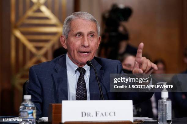 Dr. Anthony Fauci, director of the National Institute of Allergy and Infectious Diseases, responds to questions by Senator Rand Paul during the...