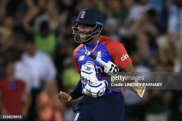 England's Chris Jordan celebrates victory during the third T20 international cricket match between England and Pakistan at Old Trafford Cricket...