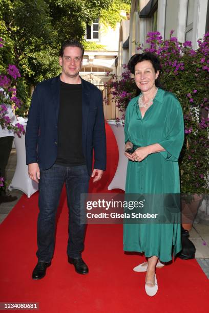 Dominik Elstner, son of Hannelore Elsner, and Bettina Reitz attend the fashion installation and special auction preview "SHE - Sonderauktion...