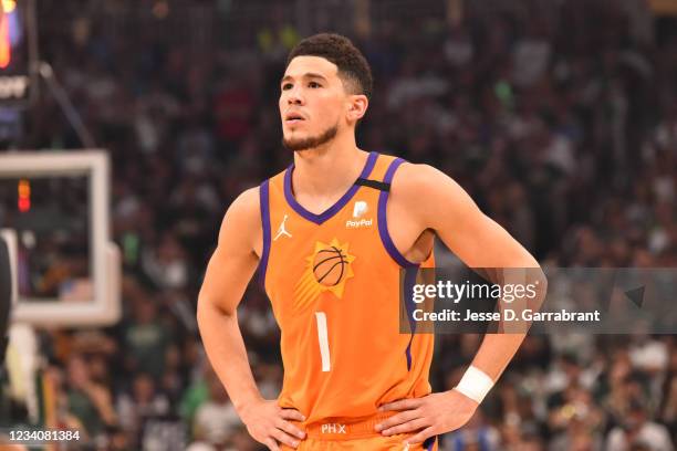 Devin Booker of the Phoenix Suns looks on during Game Six of the 2021 NBA Finals on July 20, 2021 at Fiserv Forum in Milwaukee, Wisconsin. NOTE TO...