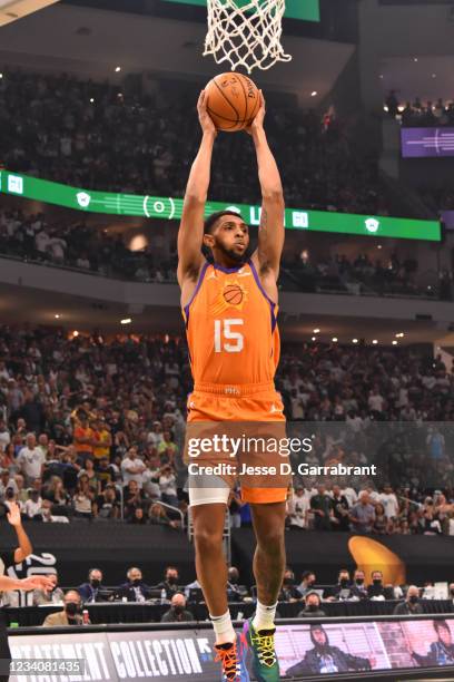 Cameron Payne of the Phoenix Suns grabs the rebound against the Milwaukee Bucks during Game Six of the 2021 NBA Finals on July 20, 2021 at Fiserv...