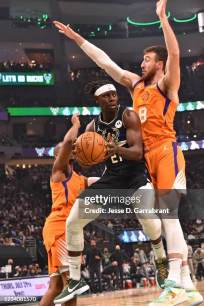 Jrue Holiday of the Milwaukee Bucks passes the ball against the Phoenix Suns during Game Six of the 2021 NBA Finals on July 20, 2021 at Fiserv Forum...