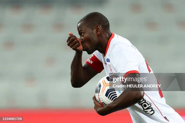 Colombia's America de Cali Gustavo Ramos celebrates after scoring against Brazil's Athletico Paranaense during the Copa Sudamericana round of 16...