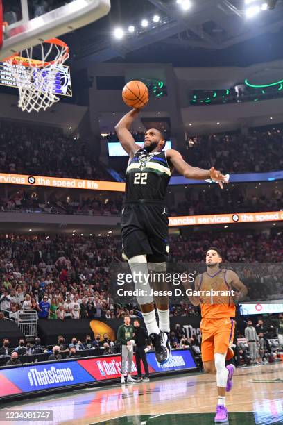 Khris Middleton of the Milwaukee Bucks dunks the ball against the Phoenix Suns during Game Six of the 2021 NBA Finals on July 20, 2021 at Fiserv...