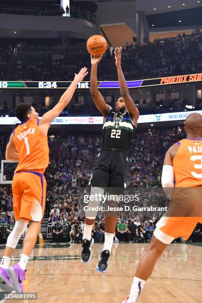 Khris Middleton of the Milwaukee Bucks shoots the ball against the Phoenix Suns during Game Six of the 2021 NBA Finals on July 20, 2021 at Fiserv...