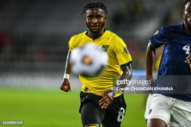 Jamaica's Oniel Fisher takes a shot during the Concacaf Gold Cup football match between Costa Rica and Jamaica at Exploria Stadium in Orlando,...