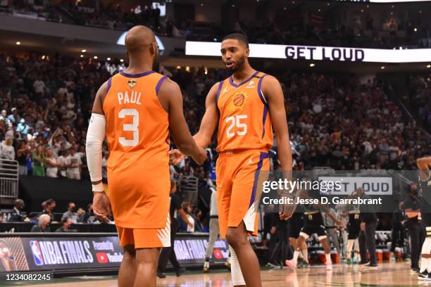 Chris Paul of the Phoenix Suns and Mikal Bridges of the Phoenix Suns high-five during Game Six of the 2021 NBA Finals on July 20, 2021 at Fiserv...