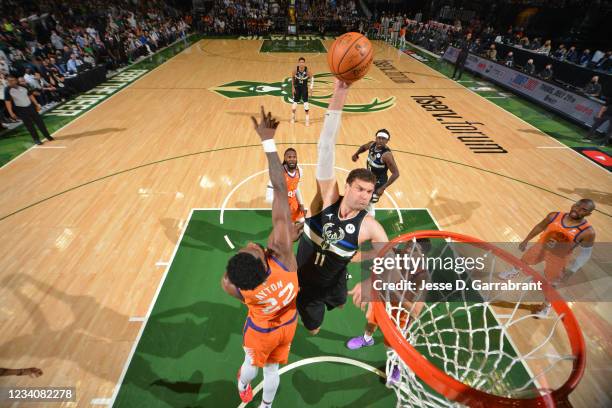 Brook Lopez of the Milwaukee Bucks dunks the ball against the Phoenix Suns during Game Six of the 2021 NBA Finals on July 20, 2021 at Fiserv Forum in...