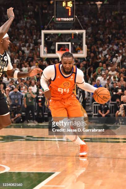 Jae Crowder of the Phoenix Suns handles the ball against the Milwaukee Bucks during Game Six of the 2021 NBA Finals on July 20, 2021 at Fiserv Forum...