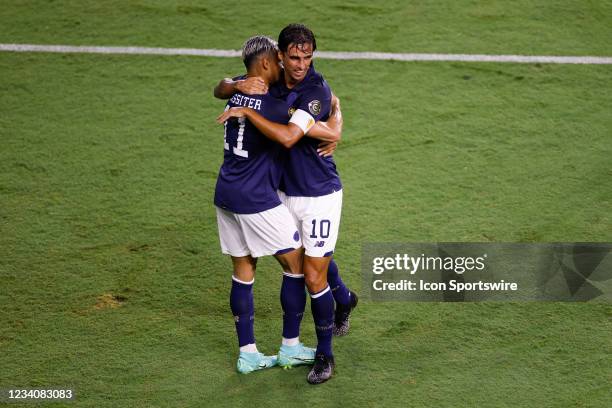 Costa Rica midfielder Bryan Ruiz and Costa Rica forward Ariel Lassiter celebrate a goal during the Concacaf Gold Cup match between Costa Rica and...