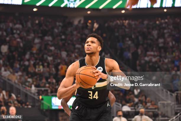 Giannis Antetokounmpo of the Milwaukee Bucks shoots a free throw during Game Six of the 2021 NBA Finals on July 20, 2021 at Fiserv Forum in...