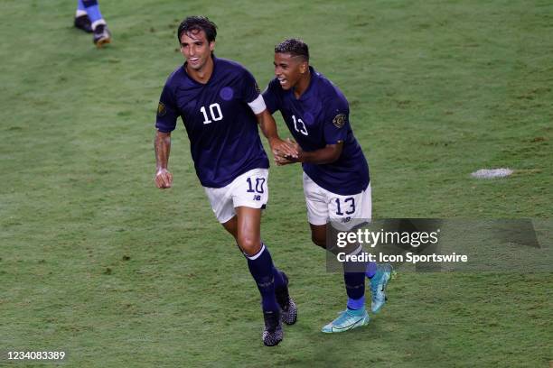 Costa Rica midfielder Bryan Ruiz and Costa Rica midfielder Allan Cruz celebrate a goal during the Concacaf Gold Cup match between Costa Rica and...