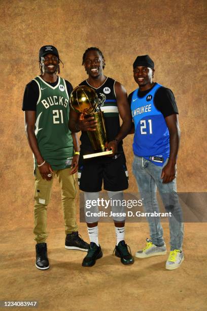 Justin Holiday of the Indiana Pacers, Jrue Holiday of the Milwaukee Bucks, and Aaron Holiday of the Indiana Pacers pose for a portrait with the Larry...