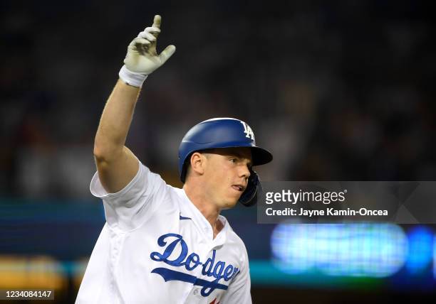 Will Smith of the Los Angeles Dodgers rounds the bases after hitting a walk off three run home run in the ninth inning of the game against the San...