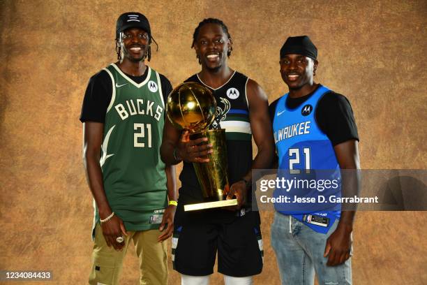 Justin Holiday of the Indiana Pacers, Jrue Holiday of the Milwaukee Bucks, and Aaron Holiday of the Indiana Pacers pose for a portrait with the Larry...