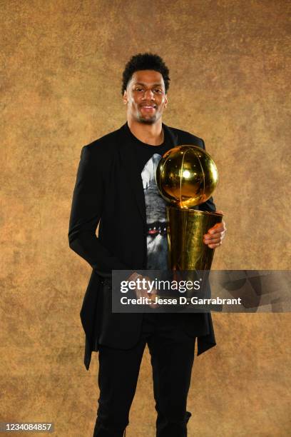 Axel Toupane of the Milwaukee Bucks poses for a portrait with the Larry O'Brien Trophy after winning Game Six of the 2021 NBA Finals against the...