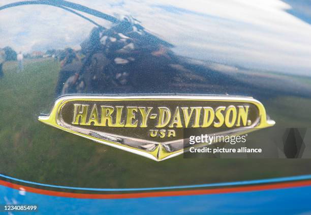 July 2021, Saxony, Dresden: The Harley-Davidson logo can be seen on the tank of a Harley during a press and photo session for the "Harley Days...