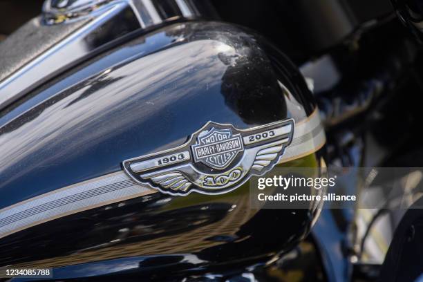 July 2021, Saxony, Dresden: The Harley-Davidson logo can be seen on the tank of a Harley during a press and photo session for the "Harley Days...