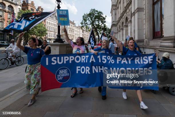 Staff, members of trade unions and health campaigners march along Whitehall during a protest demanding 15% pay increase for health workers ahead of...