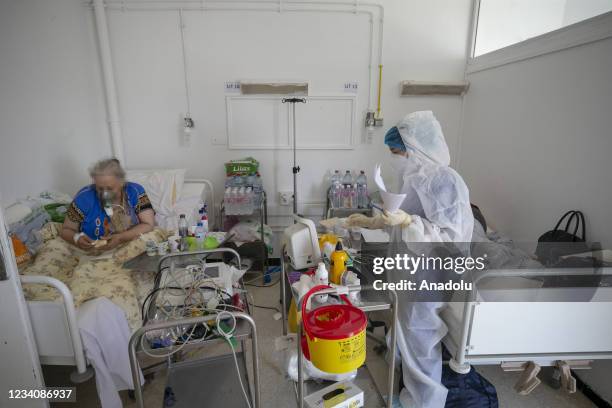 Healthcare professionals work at intensive care unit of Munci Selim Hospital, where Covid-19 patients are treated, as they spend Eid al-Adha next to...