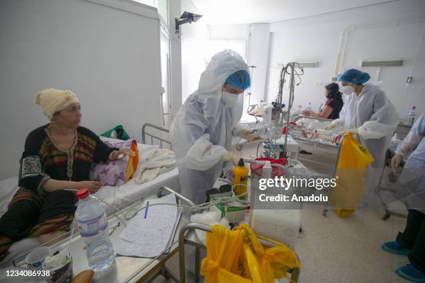 Healthcare professionals work at intensive care unit of Munci Selim Hospital, where Covid-19 patients are treated, as they spend Eid al-Adha next to...