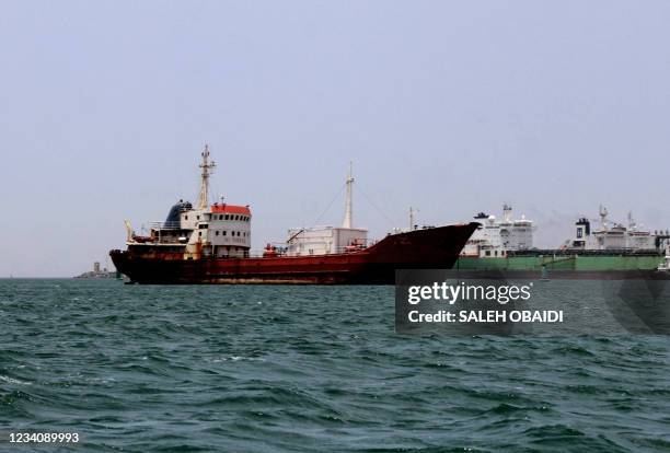 An abandoned oil tanker, at risk of sinking due to poor maintenance, is anchored off Yemen's southern port city of Aden on July 21, 2021.