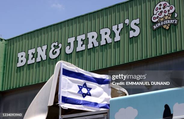 An Israeli flag is set atop a delivery truck outside US ice-cream maker Ben & Jerry's factory in Be'er Tuvia, on July 21, 2021. - Ben & Jerry's...