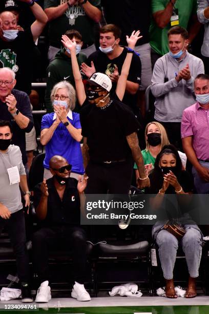 Former Milwaukee Bucks player, Brandon Jennings cheers during Game Six of the 2021 NBA Finals on July 20, 2021 at the Fiserv Forum Center in...