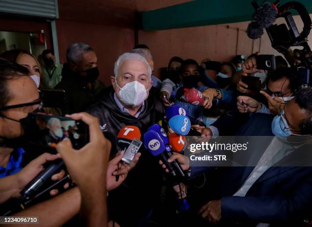 Panamanian former President Ricardo Martinelli speaks to the press after his trial at the Accusatory Penal System headquarters in Panama City, on...