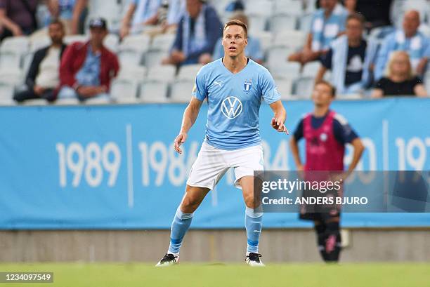 Malmo's Finnish defender Niklas Moisander reacts during the UEFA Champions League qualifying football match between Malmo and HJK Helsinki at the...