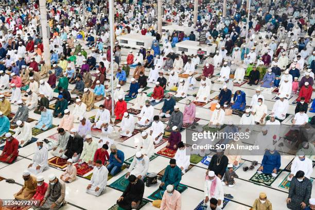 Muslims offer prayers to mark the start of the Muslim festival Eid al-Adha or the 'Festival of Sacrifice at Baitul Mukarram National Mosque in Dhaka.