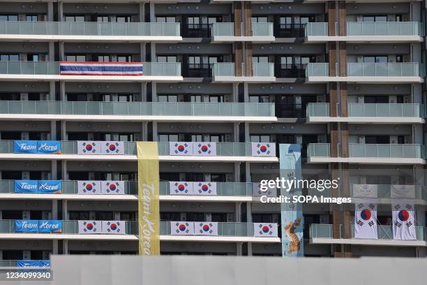 South Korean flags hang on balconies inside the Tokyo 2020 Olympic Village in Harumi. Usually the heart piece of Olympic Games, the Tokyo 2020...