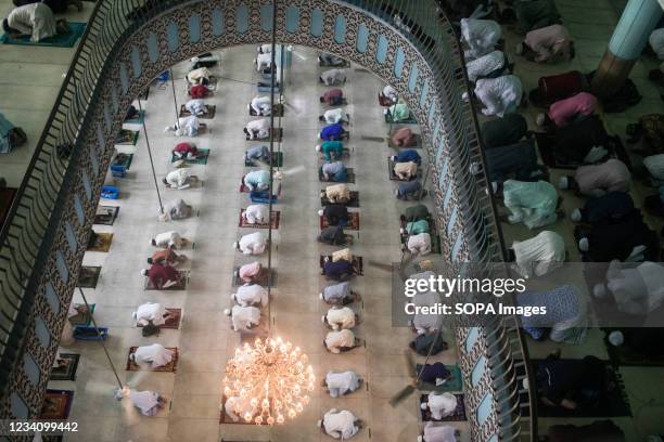 Muslims offer prayers to mark the start of the Muslim festival Eid al-Adha or the 'Festival of Sacrifice at Baitul Mukarram National Mosque in Dhaka.