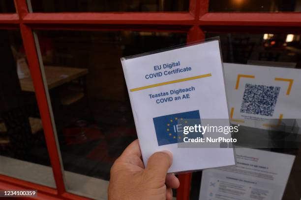 Digital certificate displayed in front of a restaurant in Bayeux. On Wednesday, July 21 in Bayeux, Calvados, Normandy, France.