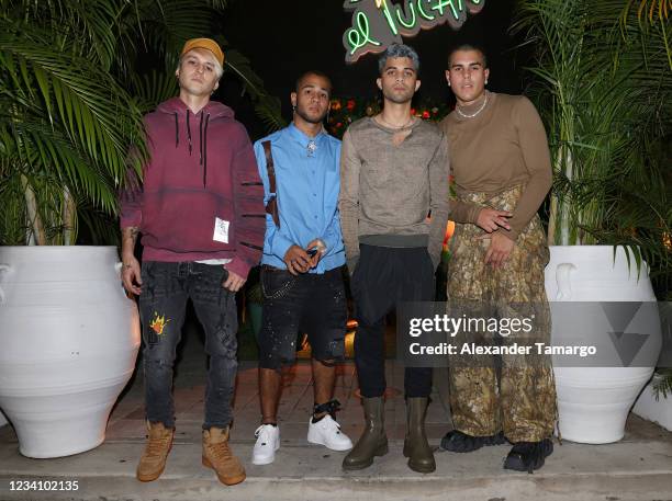 Christopher Velez, Richard Camacho, Erick Brian Colon and Zabdiel De Jesus of the musical group CNCO are seen on July 21, 2021 in Miami, Florida.